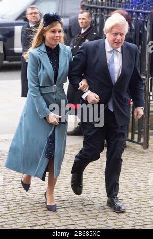 London, Großbritannien. März 2020. Der britische Premierminister Boris Johnson (R) und sein Partner Carrie Symonds kommen in der Westminster Abbey an, um am Commonwealth Day in London, Großbritannien, am 9. März 2020 am jährlichen Commonwealth Service teilzunehmen. Credit: Ray Tang/Xinhua/Alamy Live News Stockfoto