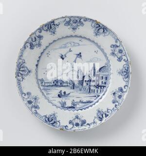 Faience Plate Bord van faience. Blauw beschilderd traf een Hollands Landschap auf Wasser. Hersteller : AnoniemPlaats Herstellung: Delft dating: CA. 1.750 - ca. 1775 Material: Faienzabmessungen: D 22,9 cm. Stockfoto