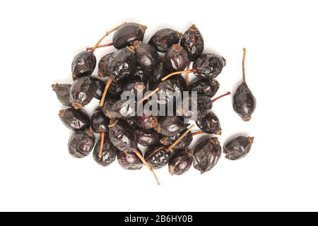Getrocknete Rosettenhüften isoliert auf weißem Hintergrund Stockfoto