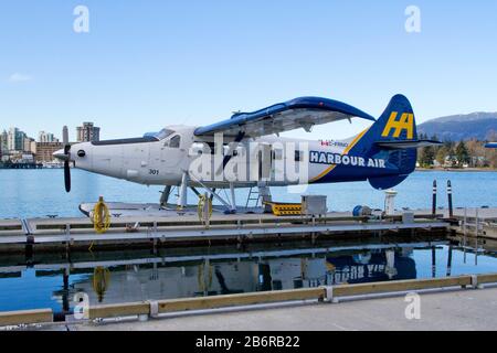 Ein Hafenluftflugzeug DHC-3 de Havilland Turbine Single Otter im Coal Harbor, Vancouver, BC, Kanada Stockfoto