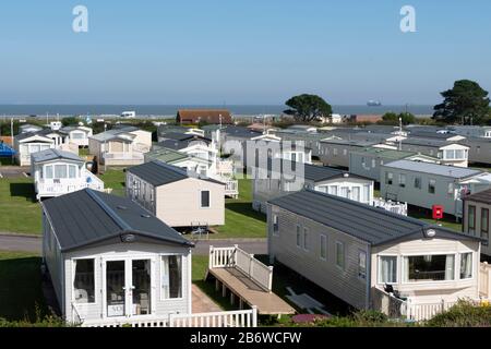 Wohnwagen im Holiday Park bei Blue Anchor, Minehead, Somerset, England Stockfoto