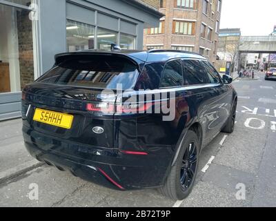 Außergewöhnliche Graffiti in Shorditch locken Touristen nach London, Großbritannien Stockfoto