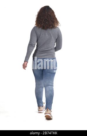 Rückansicht einer Frau, die geht Stockfoto