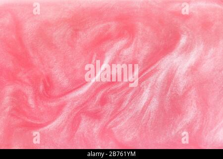 Muster aus glitzerndem Rosengwein mit schimmerndem essbarem Glitter. Abstrakter Hintergrund. Stockfoto