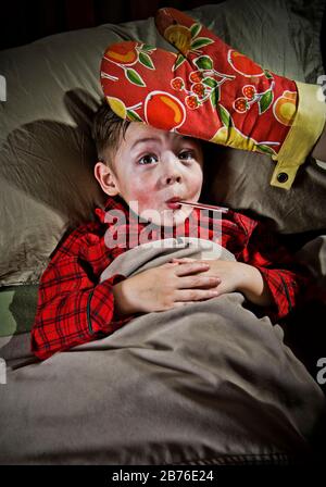 Ein Fieberkonzept / suggeriert einen sehr heißen Kopf / einen Hauch Humor Stockfoto