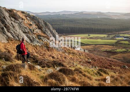 Wandern im Cairnsmore des Fleet National Nature Reserve entlang der Clints von Dromore, Galloway, Schottland, Großbritannien Stockfoto