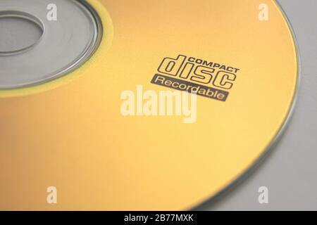 Gold-CD mit Compact-Disc-Logo-Closeup Stockfoto