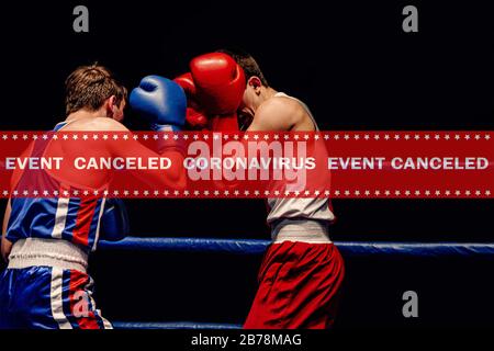Warnungsband Ereignis abgebrochen Coronavirus in Background Boxer Gegner stehen in der Verteidigung im Boxkampf Stockfoto