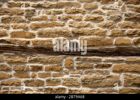 Steinmauer Zaun rustikalen Textur Hintergrund im Hinterhof. Stockfoto