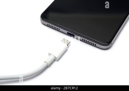 USB-Ladekabel Typ C und Smartphone Stockfoto
