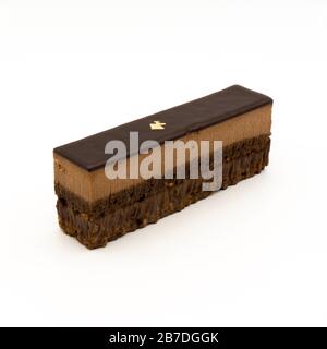 Ein Stück von drei Schokoladen Schokoladendessert. Stockfoto