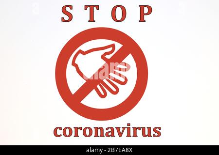 Isoliertes rotes Verbotsschild mit Handsymbol. Handshake-Verbot-Konzept mit der Aufschrift Stop Coronavirus. Prävention der Pandemie Stockfoto