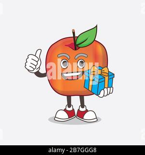 Ein Bild von Honeycrisp Apple Zeichentrick-Maskottchen mit Geschenk Stockfoto