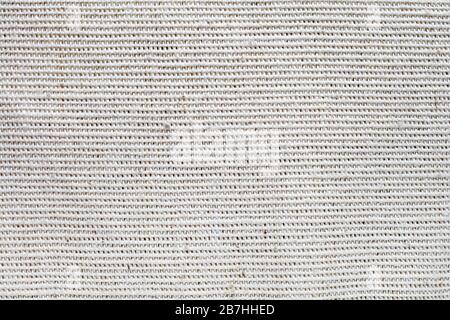 Leichte Hintergrundstruktur aus Burlap-Material Stockfoto