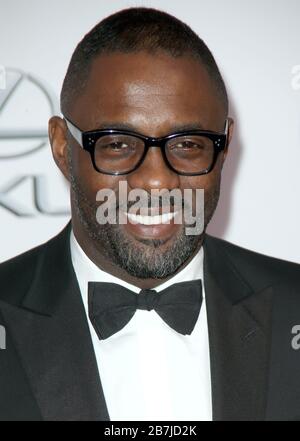 ***DATEIFOTO*** 16. März 2020. Idris Elba bestätigt, dass er Coronavirus positiv ist. PASADENA, CA - 22. FEBRUAR: Idris Elba kommt bei den 45. NAACP Image Awards in Kalifornien an. Februar 2014. Kredit: mpi99/MediaPunch Credit: MediaPunch Inc/Alamy Live News Credit: MediaPunch Inc/Alamy Live News Stockfoto