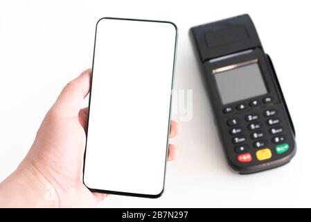 Mobiltelefone und POS-Maschinen im Büro Stockfoto