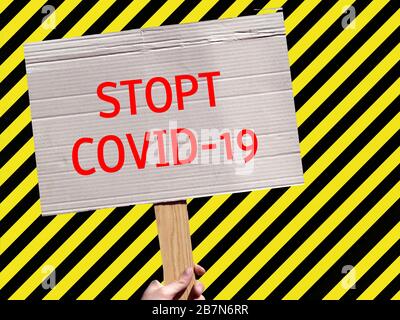 Symbol für STOP COVID-19 signieren Stockfoto