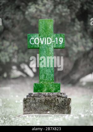 Opfer des COVID-19, grünes Grab, selektiver Fokus Stockfoto