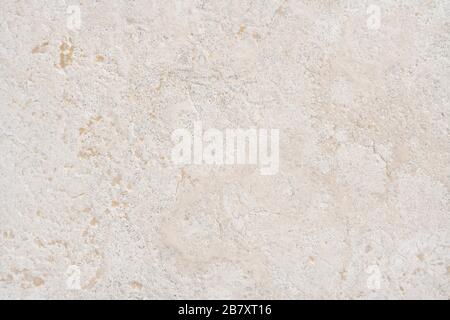 Beige Marmor Kalkstein ähnlich der natürlichen Oberfläche für Bad oder Küche Arbeitsplatte. Hochauflösende Texturen und Muster. Stockfoto