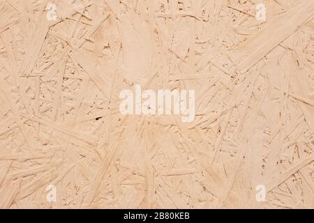 Beige Spanplatten Nahaufnahme Textur Hintergrund Holz. Nahaufnahme. Kopierbereich Stockfoto