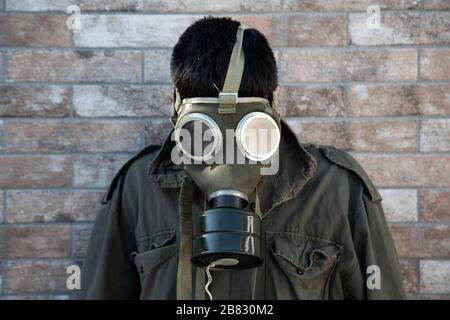 Gasmaske fürchtet Schimakale Schreckenskorona Stockfoto