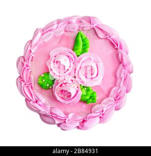 Bunte Kuchen mit cremefarbenen Blumen und isoliert auf weißem Hintergrund. Rosa Cremekuchen Draufsicht. Isolierter Kuchen. Stockfoto