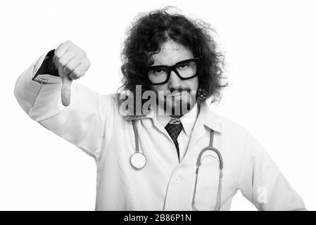 Studio shot von enttäuscht man Arzt, der Daumen nach unten Stockfoto