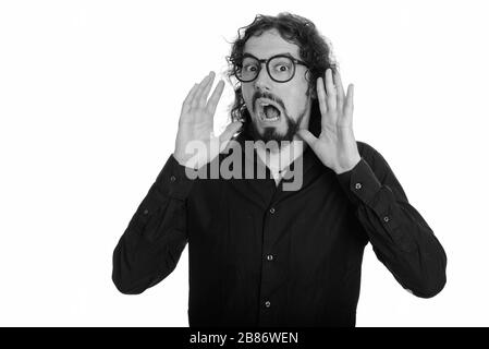 Ein gutaussehender kaukasischer Mann, der überrascht aussehend war Stockfoto