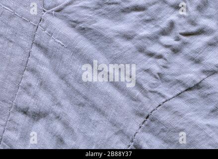 Abstrakte Textur auf blauem Canvas. Leinwandtextur für den Hintergrund. Hintergrundfarbe aus blauem Stoff Stockfoto