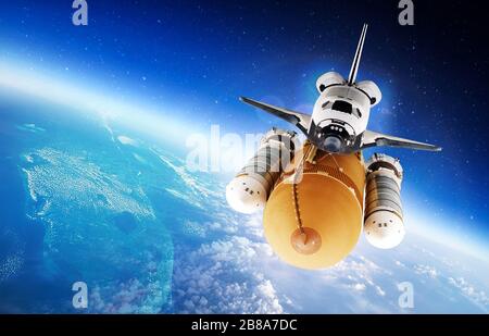 Space Shuttle umkreist die Erde. Elemente dieses Bildes, das von der NASA eingerichtet wurde. Stockfoto