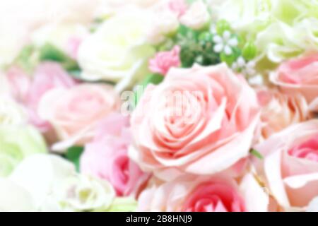Verschwommenes Rosenbross weicher Blumenstrauß für den Hintergrund, Rosen blumen verschwommene rosa Farbe Pastell, Rose süße Farbe Unschärfe Stockfoto