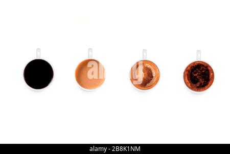 Vier Tassen verschiedener Kaffees, alleine, mit Milch, Cappuccino, Macchiato Stockfoto