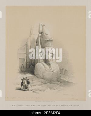 Eine von zwei kolossalen Statuen von Rameses II Eingang zum Tempel von Luxor aus Ägypten und Nubien, Band I: Eine von zwei kolossalen Statuen von Rameses II Eingang zum Tempel von Luxor, im Jahre 1848. Louis Haghe (Britisch, 1806-1885), F.G.Moon, 20 Threadneedle Street, London, nach David Roberts (Britisch, 1796-1864). Farblithograph; Stockfoto