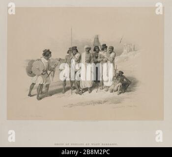 Gruppe der Nubier Wady Kardassy in Nubien aus Ägypten und Nubien, Band I: Louis Haghe (Britisch, 1806-1885), F.G.Moon, 20 Threadneedle Street, London, nach David Roberts (Britisch, 1796-1864). Farblithograph; Stockfoto