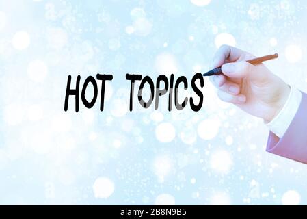 Konzeptionelle Hand schreiben Heiße Themen angezeigt. Konzept Bedeutung betrifft, die eine Menge angezeigt sind, Argumentieren und Diskutieren Stockfoto