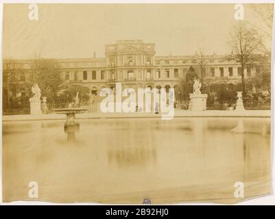 Tuilerien im Jahr 1871. Ruinen des Tuilerien-Palastes aus dem Garten der Tuilerien, 1. Bezirk, Paris Ruines du Palais des Tuileries depuis le jardin des Tuileries, Paris (Ier arr.). Photographie anonyme. 1871. Paris, musée Carnavalet. Paris, musée Carnavalet. Stockfoto