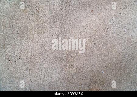 Struktur der grau gestrichenen oder verputzten schmutzigen Wand für Hintergrund und Design Stockfoto