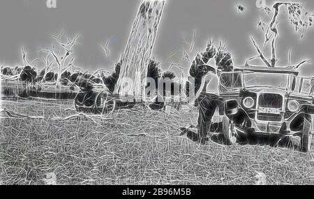 Negativ - Chetwynd District, Victoria, 1937, Männer schneiden rotes Zahnfleisch mit einem automatischen Logger von Deutsch Deuitcher auf der Station "Glenelg Vale"., von Gibon neu vorgestellt, Design von warmem, fröhlichem Leuchten von Helligkeit und Lichtstrahlen. Klassische Kunst mit moderner Note neu erfunden. Fotografie, inspiriert vom Futurismus, die dynamische Energie moderner Technologie, Bewegung, Geschwindigkeit und Kultur revolutionieren. Stockfoto