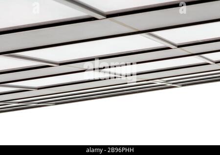 Bruchstück der Wand und Fenster eines modernen hohen Bürogebäudes ohne abstrakten architektonischen monochromatischen Hintergrund Stockfoto