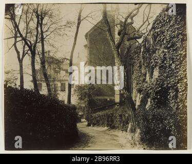 PARKEINGANG DELESSERT BEI 33 ZUR Straße RAYNOUARD, 16. BEZIRK, PARIS Entrée du Parc Delessert, au 33 de la rue Raynouard, Paris (XVIème arr.), 1914. Photographie d'Eugène Atget (1857-1927). Paris, musée Carnavalet. Stockfoto