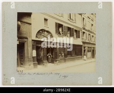 ZEICHEN des KABARETTS "SONNE DES GOLDES", 84 HEILIGER HEILAND, 2. BEZIRK, PARIS Enseigne, "Au soleil d'Or", Kabarett, 84 rue Saint-Sauveur, Paris (IIème arr.), Septembre 1899. Photographie d'Eugène Atget (1857-1927). Paris, musée Carnavalet. Stockfoto