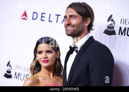 Los Angeles, Vereinigte Staaten. März 2020. (AKTE) Maren Morris Welcomes First Baby mit Ehemann Ryan Hurd. Die 29-jährige "Bones"-Sängerin begrüßte am Montag, 23. März 2020, ihr erstes Kind mit Ehemann Ryan Hurd. LOS ANGELES, KALIFORNIEN, USA - 8. FEBRUAR: Sänger Maren Morris und Ehemann Ryan Hurd kommen zur Person MusiCares des Jahres 2019, die Dolly Parton ehrt, die am 8. Februar 2019 im Los Angeles Convention Center in Los Angeles, Kalifornien, Vereinigte Staaten abgehalten wird. (Foto von Xavier Collin/Image Press Agency) Credit: Image Press Agency/Alamy Live News Stockfoto