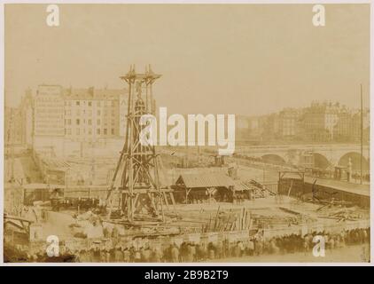 Mai 1858. Verschieben des Palmenbaums. Umzug des Palmenbrunnens, Place du Châtelet, 1. Bezirk Déplacement de la fontaine du Palmier, Place du Châtelet. Paris (Ier arr.). Photographie de Charles Marville (13-1879). Tirage sur Papier albuminé à partir d'un négatif sur verre au collodion humide. 5 Mai 1858. Paris, musée Carnavalet. Stockfoto