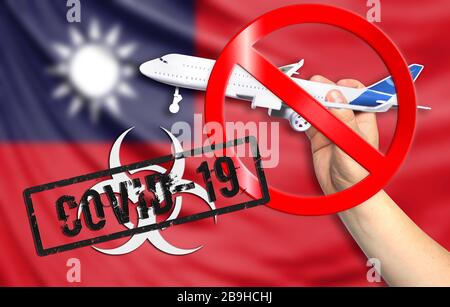 Eine neue Coronavirus Krankheit namens COVID - 19 mit der Flagge Taiwans. Enthält das Konzept eines Flugverbots zwischen Ländern. Stockfoto