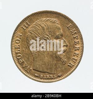 Teil 10 Francs in Gold Napoleon III., d. H. Im Jahre 304, Jacques-Jean Barre (173-1855).pièce de 10 Francs en oder de Napoléon III, im Jahre 304. Oder. Im Jahr 1854. Paris, musée Carnavalet. Stockfoto