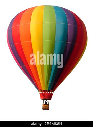 Regenbogenfarbiger Heißluftballon vor weißem Hintergrund. Pilot in Silhouette. Stockfoto