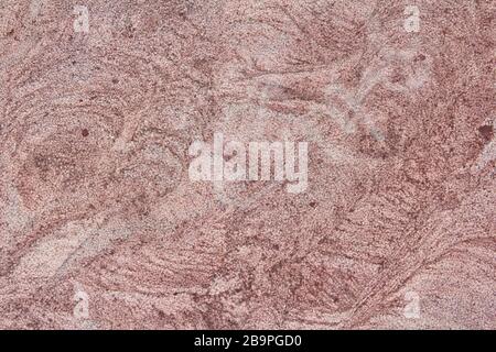 Natürliche Textur aus rosafarbenem Granit. Hintergrund für Text und Design. Stockfoto