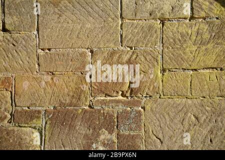 Eine Steinwand, die als Hintergrundbild geeignet ist. Stockfoto