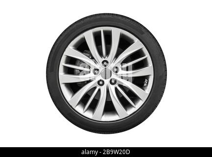 Modernes Luxus-Autorad auf einer Leichtmetallscheibe, isoliert auf weißem Hintergrund Stockfoto