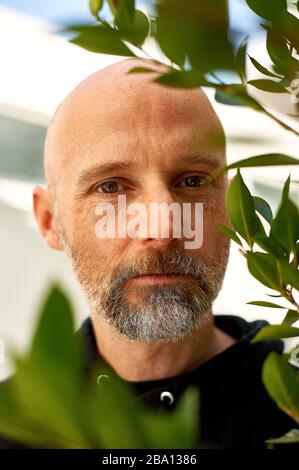 Musikkünstler, Produzent und Tierrechtler Moby in seinem Restaurant Little Pine in Los Angeles, Kalifornien. Stockfoto